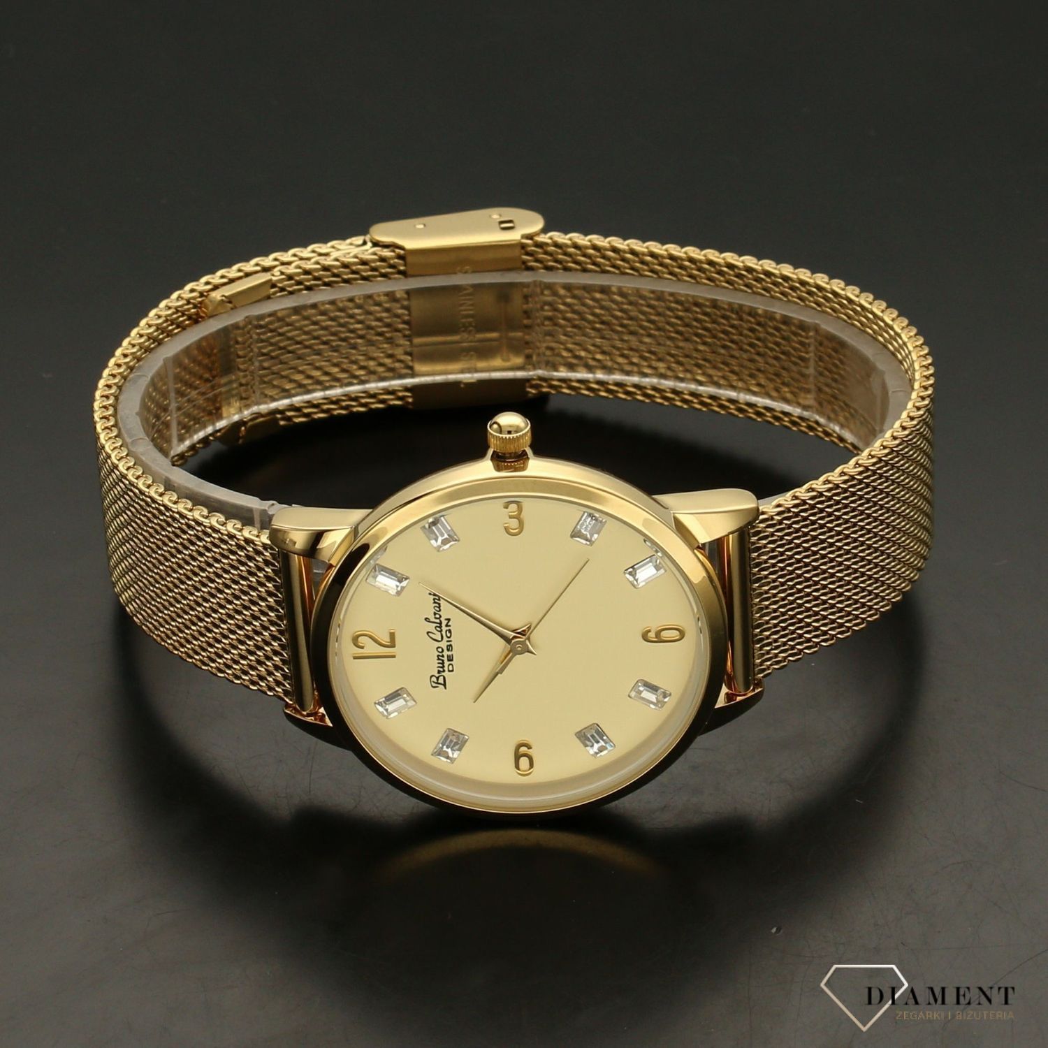 Zegarek damski BRUNO CALVANI złoty z kryształami BC90533 GOLD. Złoty zegarek damski z ozdobną tarczą. Indeksy w formie błyszczących kryształów. Zegarek damski ze stalową bransoletką typu mesh w kolorze złotym (4).jpg